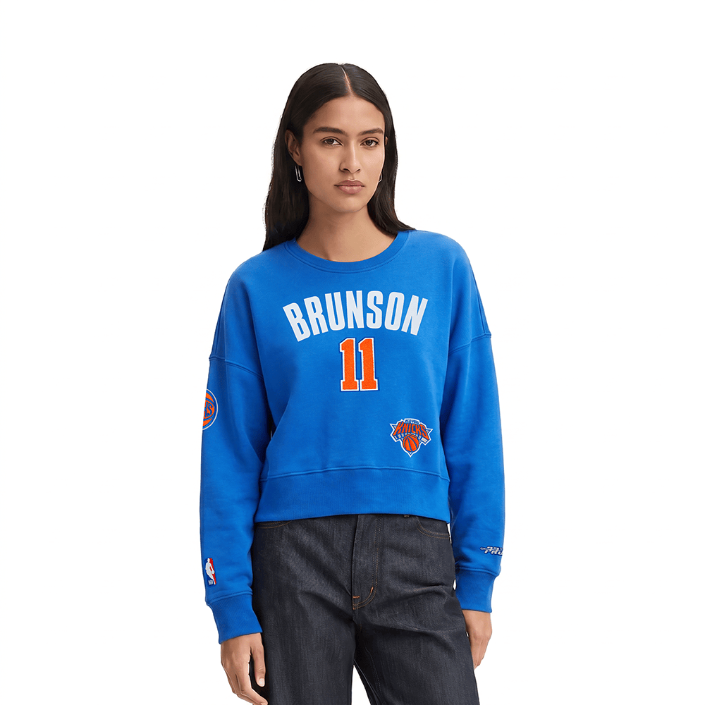 NBA NEW YORK KNICKS JALEN BRUNSON #11 CLASSIC PLAYER NAME AND NUMBER Women FLC CREWNECK product image 1, provided for visual